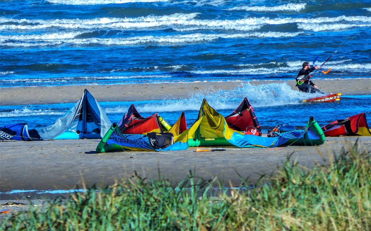 Kitesurfer riding on a Scottish beach